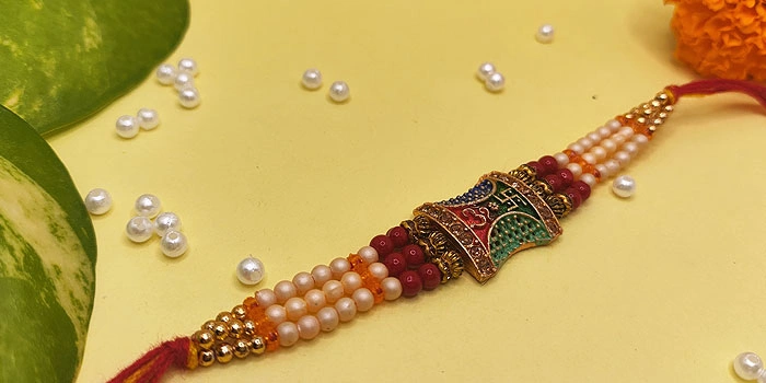 RDS 2-in-1 Design Rakhi with Om and Swastik Design and Roli - Chawal