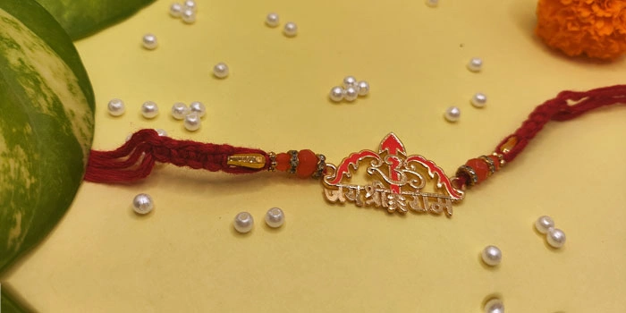 RDS Divine Bow Shaped Rakhi with Jai Shree Ram Design and Roli - Chawal