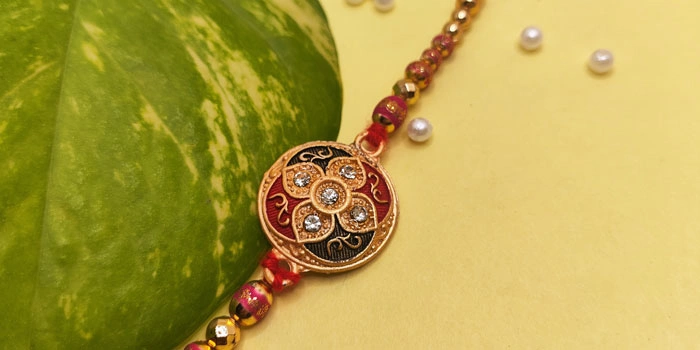 RDS Round Shaped Rakhi with Colorful Design and Stones and Roli - Chawal