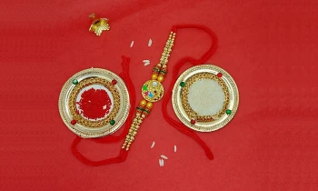 Designer White Stone Studded Rakhi with Free Roli and Chawal