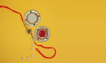 Designer Ganesha Statue with Stone Studded Rakhi with Free Roli and Chawal